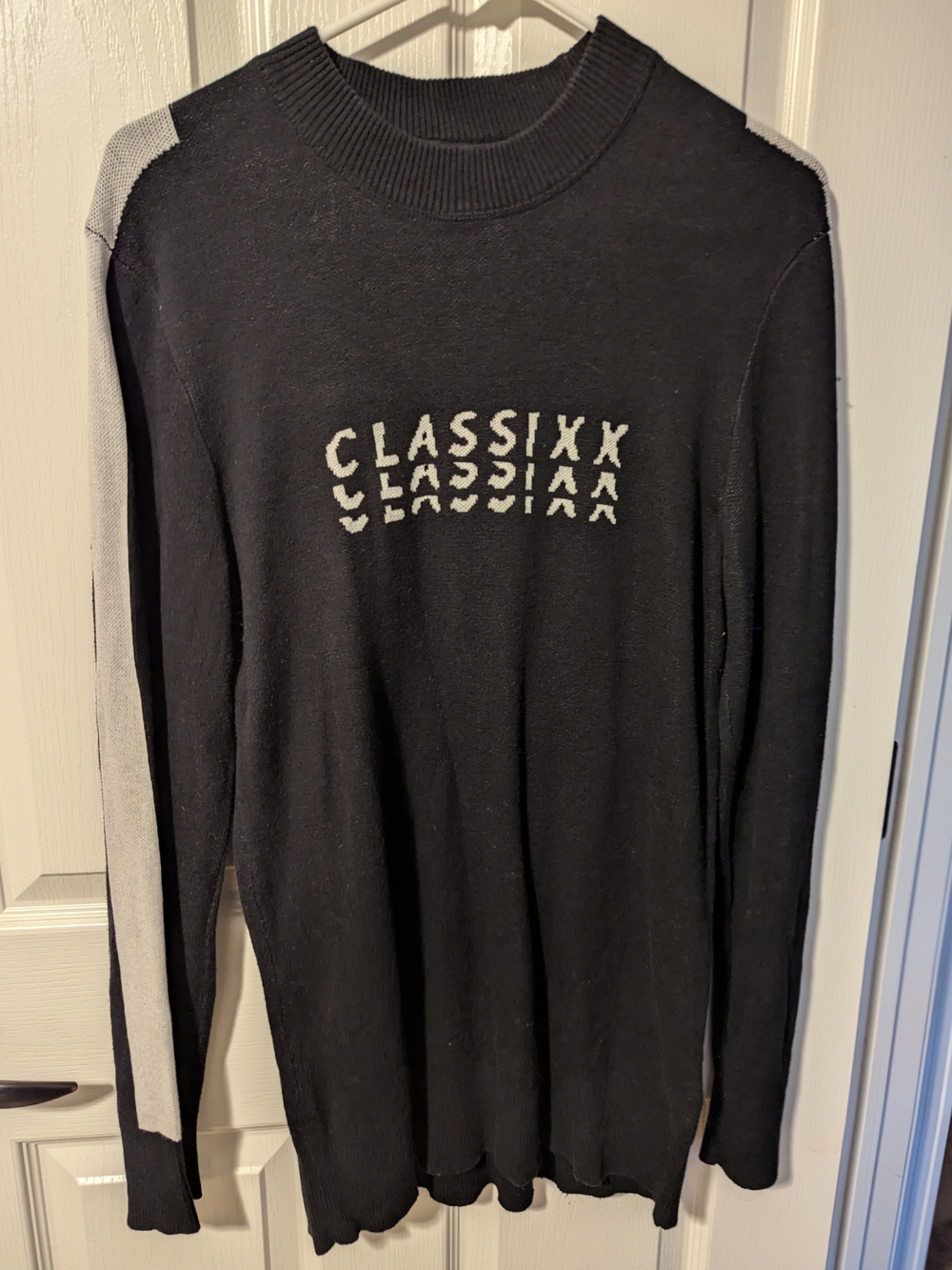 H&M Black Crewneck Sweater with Light Gray Sleeve Stripes and Logo